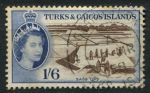 Теркс и Кайкос 1957 г. • Gb# 247 • 1s.6d. • Елизавета II основной выпуск • добыча морской соли • Used XF ( кат.- £ 3 )